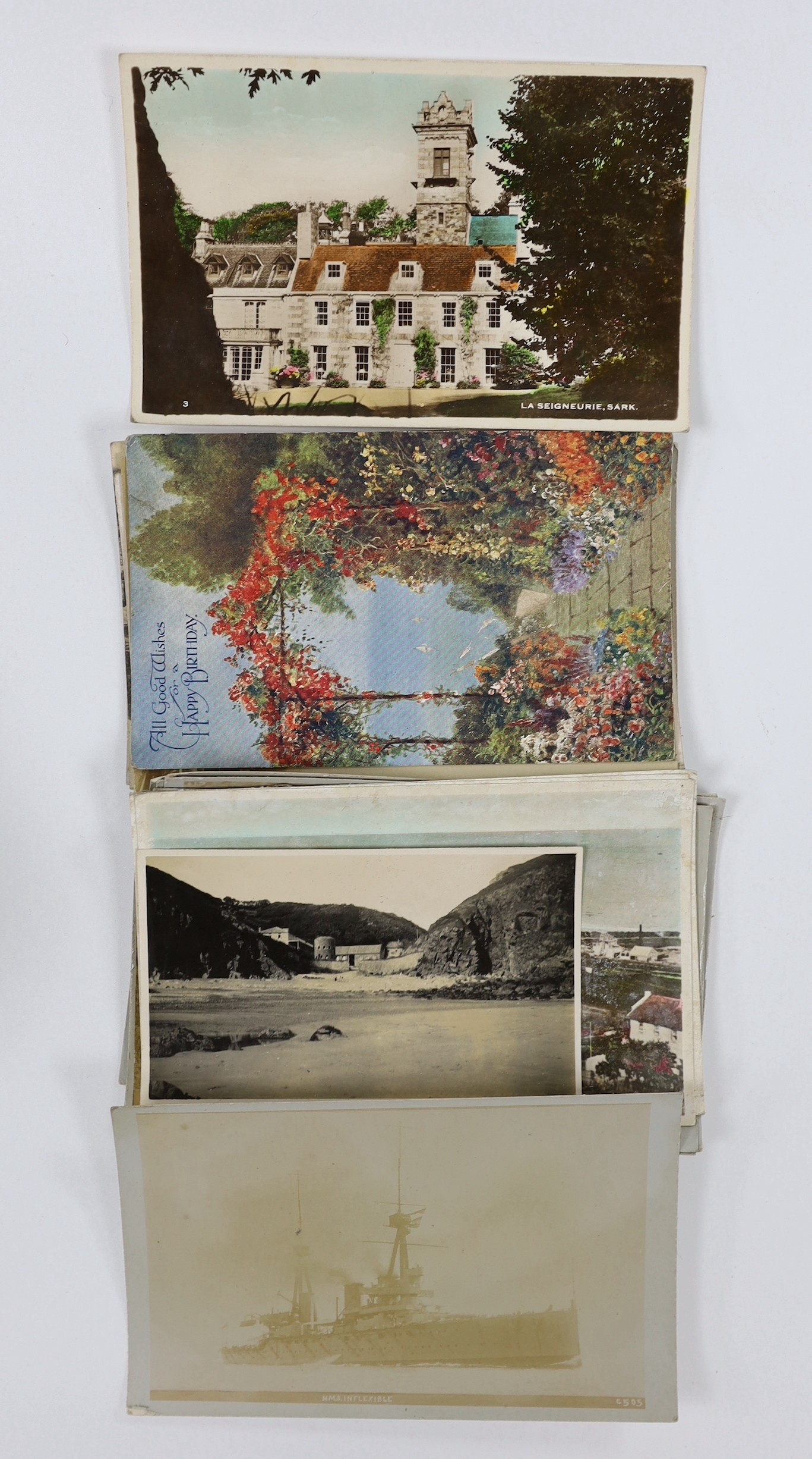 A collection of Edwardian and later topographical postcards, loose and in booklets